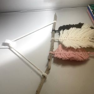 It’s macramé feathers it’s been a glory to make it handmade from me